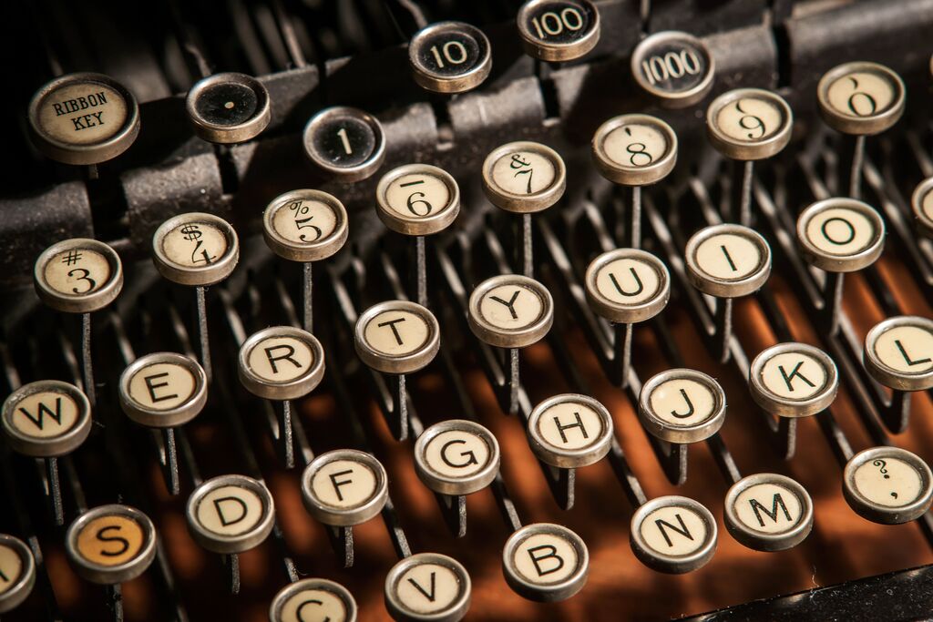 The antique typewriter found in the space helps create the feeling of a station master's office.